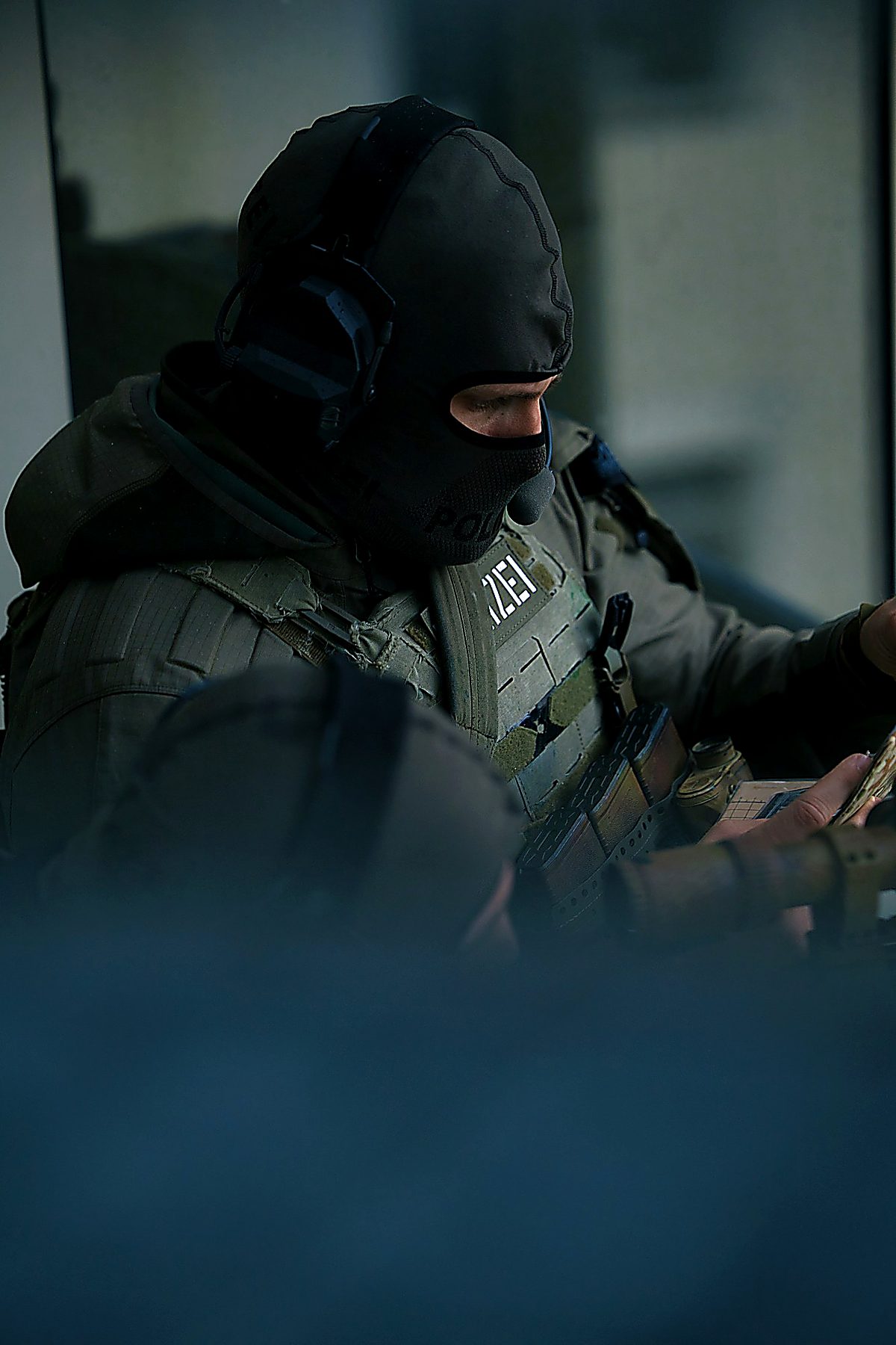 Operator with balaclava — Schöffel TEC gear in action